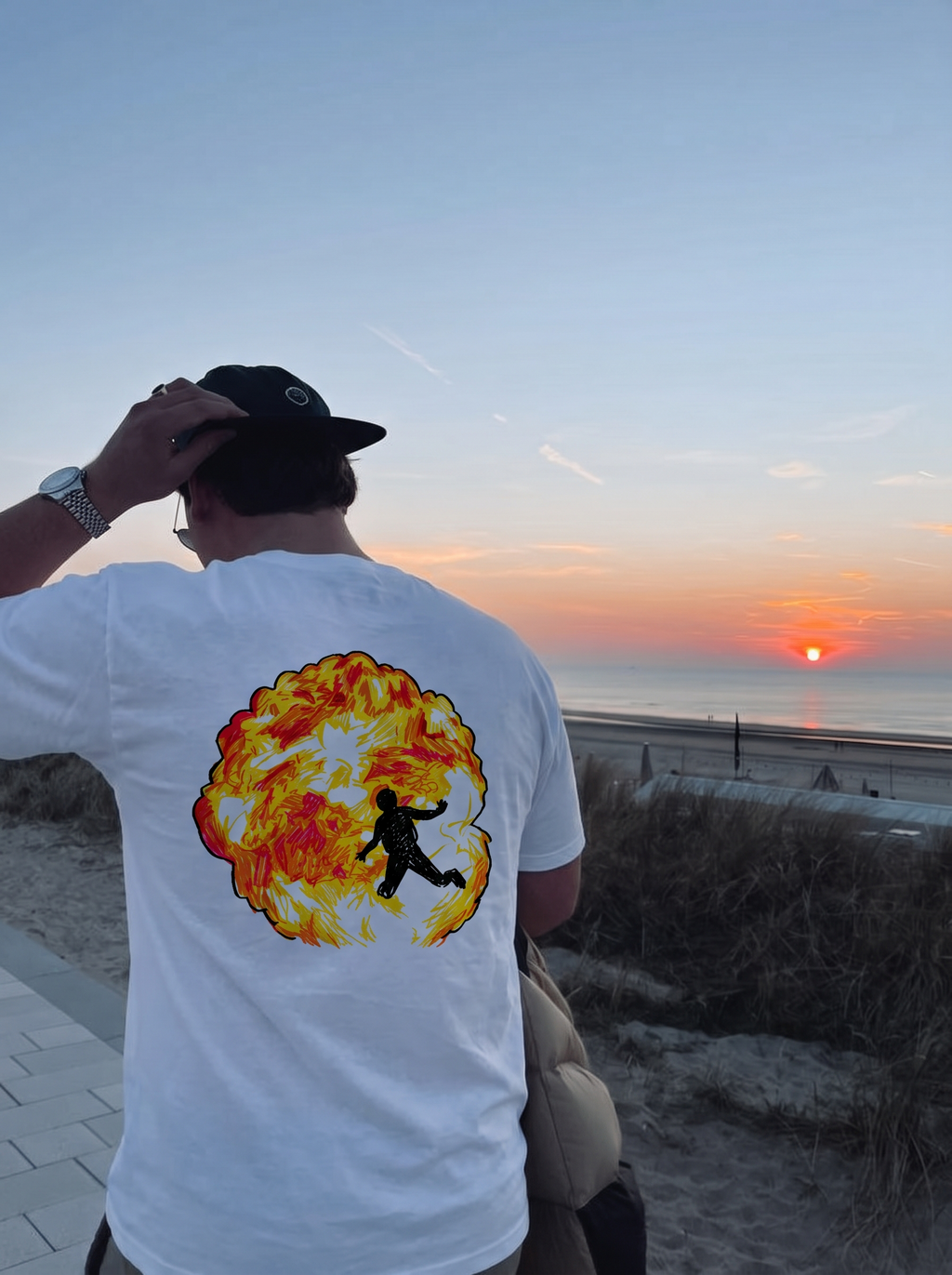 Metro Boomin tee, back print worn by the beach at sunset