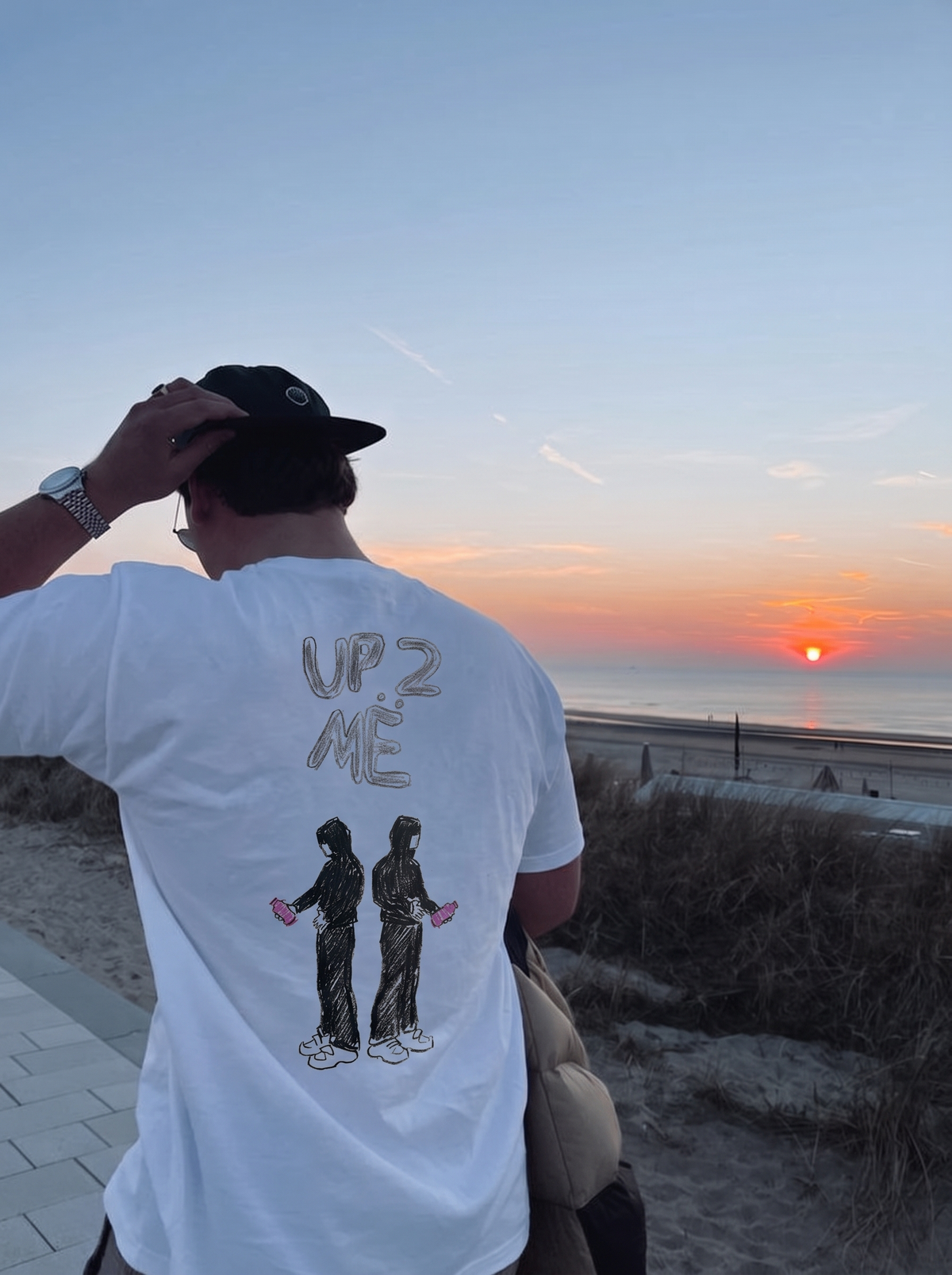 Up 2 Me tee, back print worn at the beach at sunset